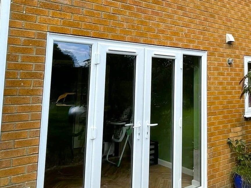 White French doors opening onto a patio