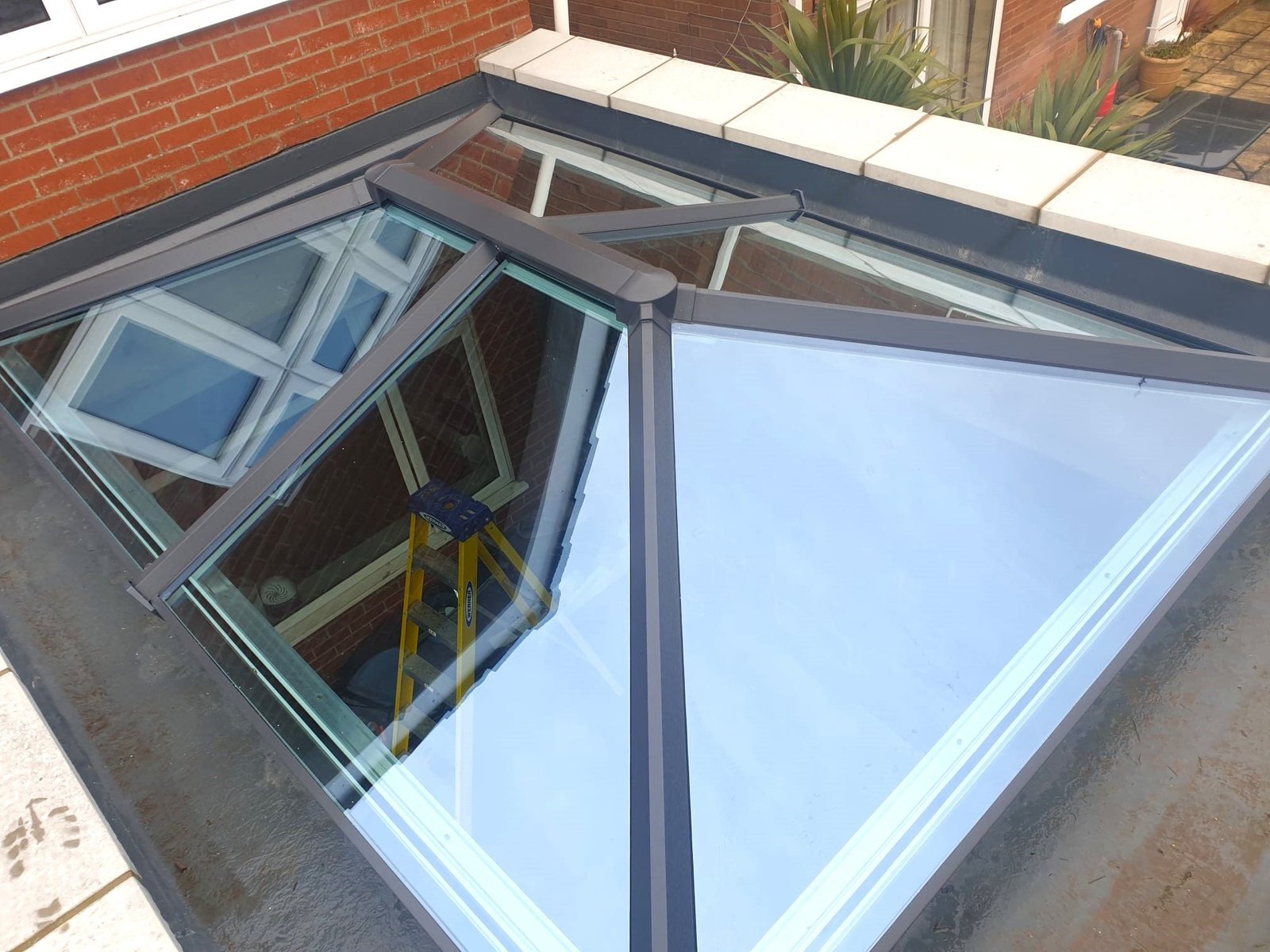 A glazed conservatory roof seen from above